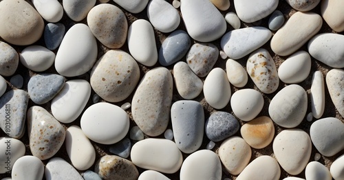White beach stones background. Colorful pebbles texture wallpaper. Beautiful, seamless pattern