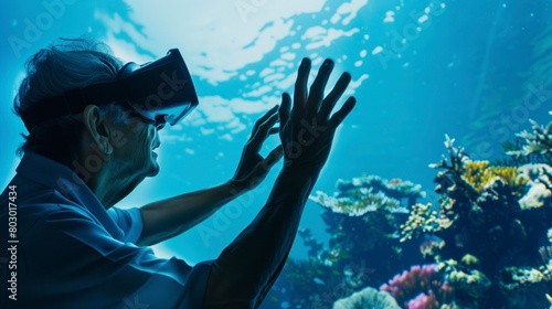 Elderly man experiencing underwater VR simulation