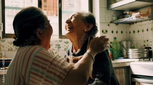 Elderly Women Sharing a Laugh in Kitchen