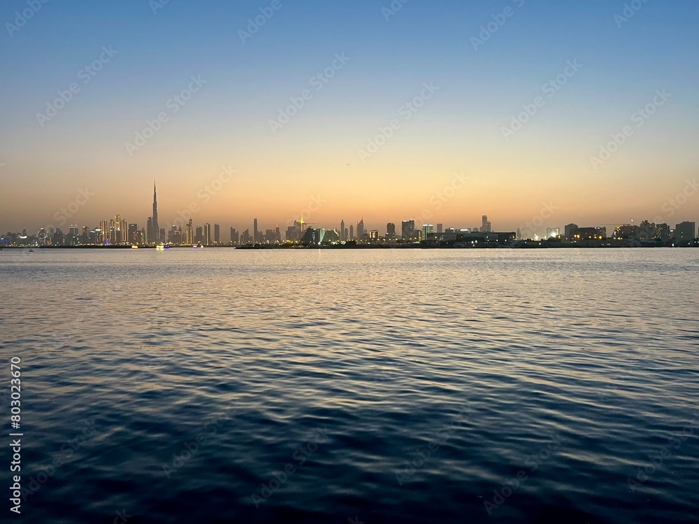 City river at the sunset time, silhouette of the cityscape at the river, twilights City river at the sunset time, silhouette of the cityscape at the river, twilights