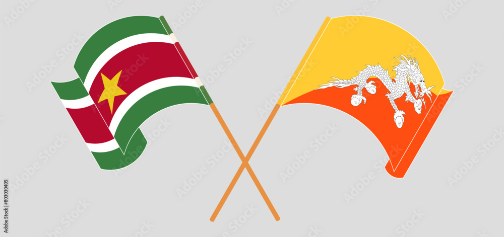 Crossed and waving flags of Suriname and Bhutan Crossed and waving flags of Suriname and Bhutan