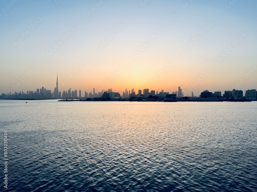 City river at the sunset time, silhouette of the cityscape at the river, twilights City river at the sunset time, silhouette of the cityscape at the river, twilights