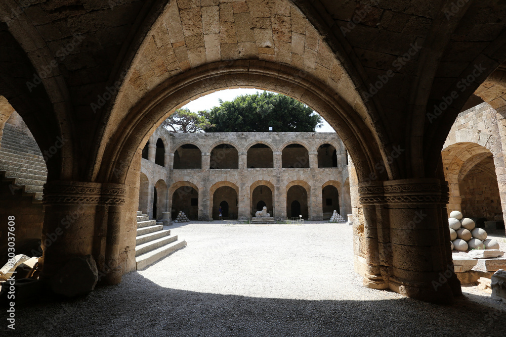 Rhodes, Greece - August 10, 2017: Archaeological museum, arches, stone building, medieval old european architecture