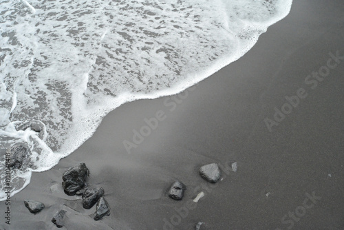 Izu Oshima’s black sand beach and waves photo