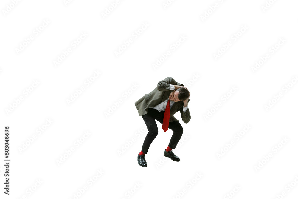 Man in a suit, employee holding head with both hands, expressing despair, frustration and annoyance isolated on transparent background. Concept of emotions, employment, business, stress, mental health