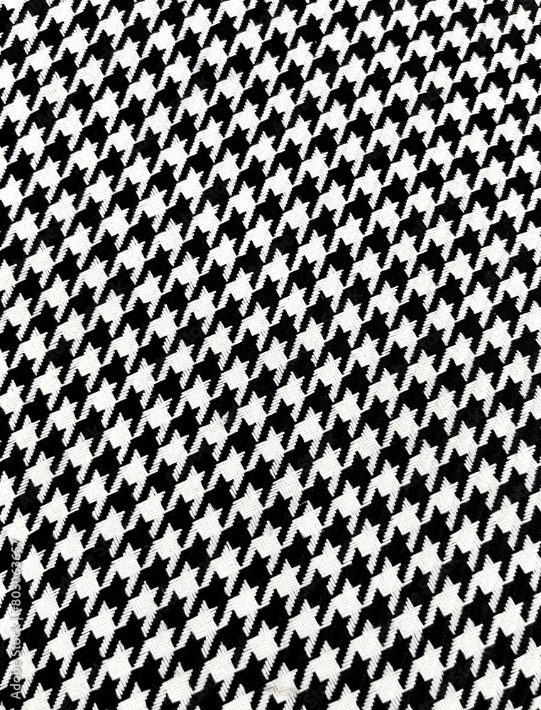 Soft abstract black and white pattern fabric object textured material isolated on vertical ratio background. Soft abstract black and white pattern fabric object textured material isolated on vertical ratio background.
