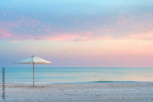 Serene Beach at Sunrise with Pastel Sky and Beach Umbrella, Tranquil Morning Seascape, Copy Space