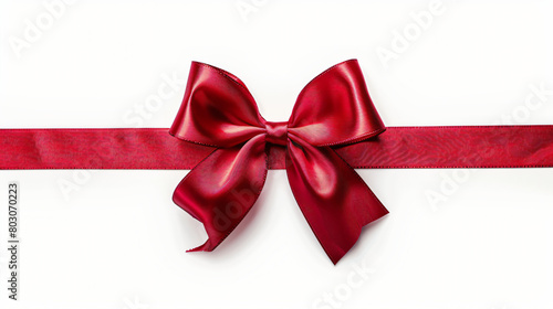 Bow made of red ribbon on white background