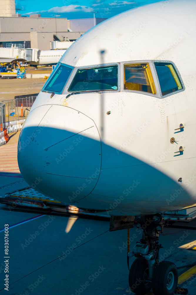 Front view of generic commercial aircraft cockpit nose Front view of generic commercial aircraft cockpit nose
