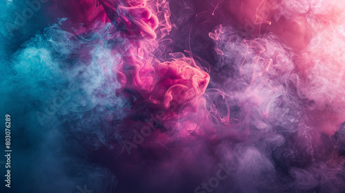 Fuchsia and emerald wisps of smoke curl around each other like ethereal lovers photo