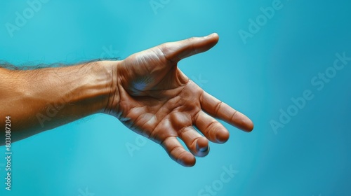 Man hand isolated on blue background