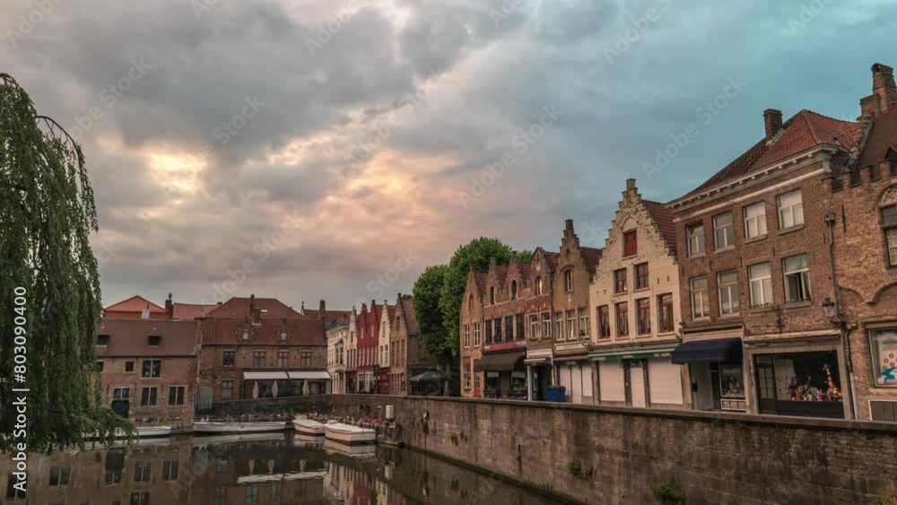 Bruges Belgium time lapse, city skyline night to day at Rozenhoedkaai Bruges Belgium time lapse, city skyline night to day at Rozenhoedkaai