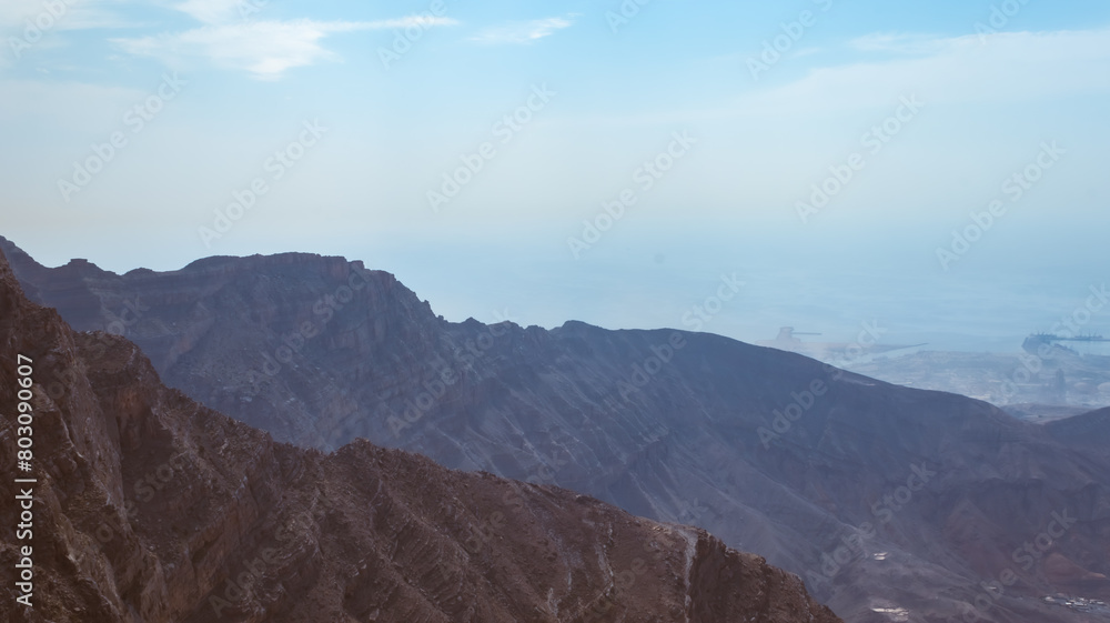 Jebel jais mountain, Majestic Rocky Mountains Under Clear Blue Sky During a Sunny Day