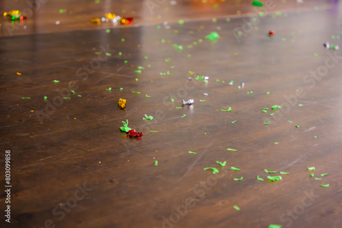 The day after the party. Empty room with confetti and balloons on the floor. photo