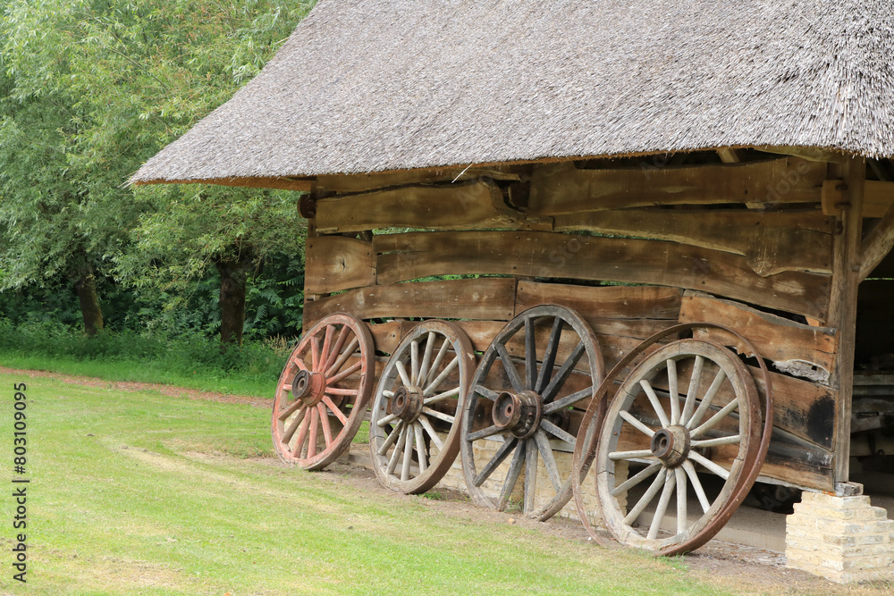 Obraz premium ancient barn with wooden wheels in Bokrijk, Genk, Belgium