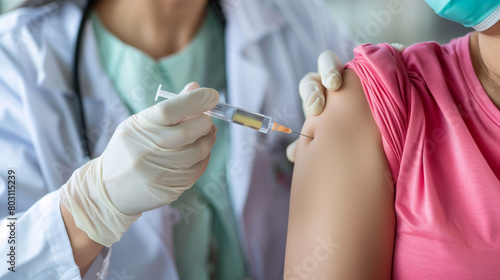 a patient being vaccinated by a doctor 