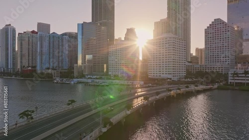 Miami Brickell Key. Miami USA downtown. Aerial view of cars driving on the bridge towards Miami downtown Brickell Key Skyline at sunset photo