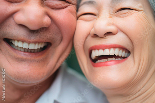 An elderly couple laughing together, grateful for their exceptional healthcare. Health insurance
