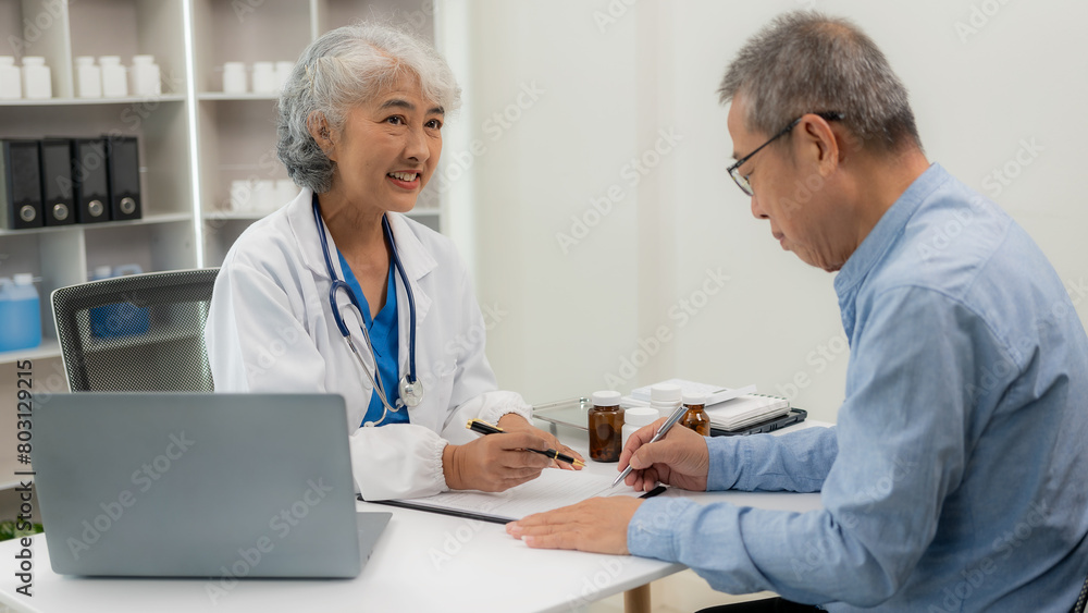 Senior Asian female doctor examining patient's health, basic procedures for general examination history taking Physical examination, gastritis, high blood pressure, medical consultant concept