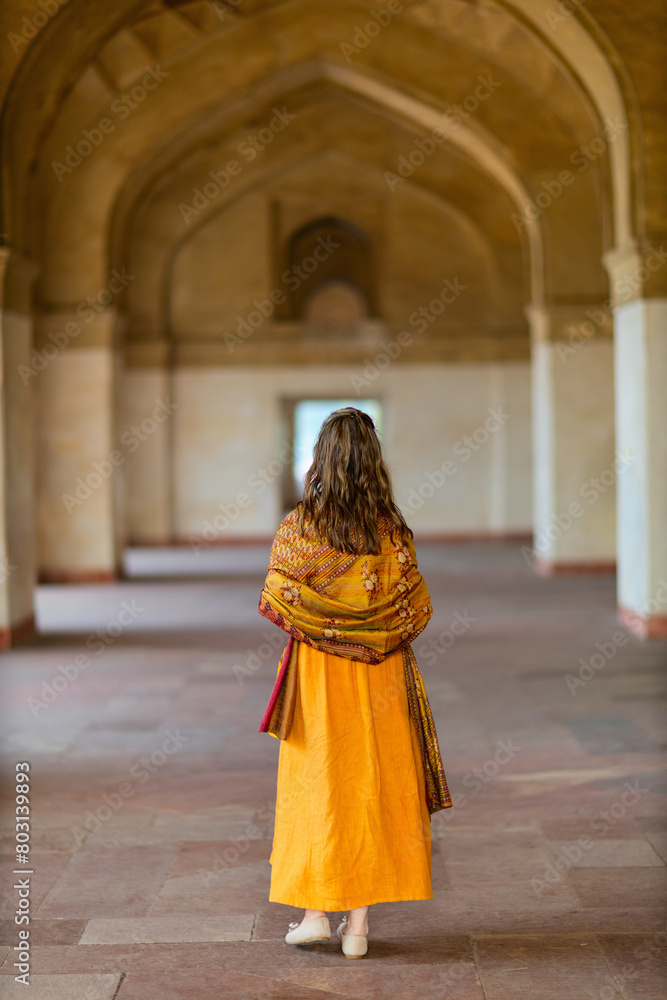 Naklejka premium Woman on vacation in India