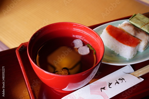 日本料理 柿の葉寿司 お吸い物 - Persimmon Leaf Sushi or Kakinoha-sushi and Osuimono or Clear Dashi Soup, Japanese food	 photo