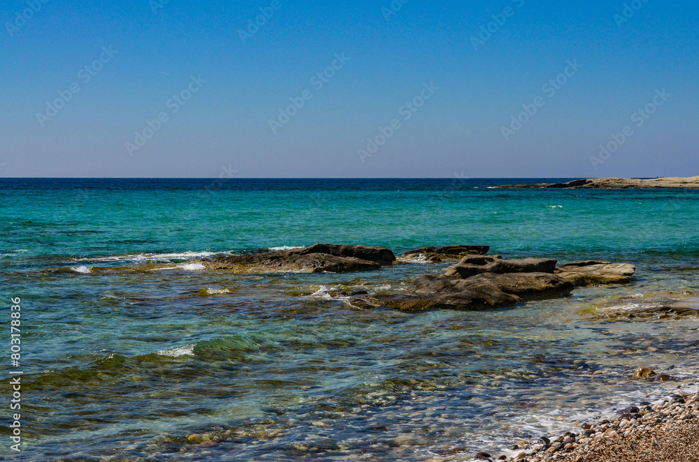 reefs and crystal clear water of Aegean Sea on Gilikli beach near Alacati (Cesme, Izmir province, Turkey)
reefs and crystal clear water of Aegean Sea on Gilikli beach near Alacati (Cesme, Izmir province, Turkey)