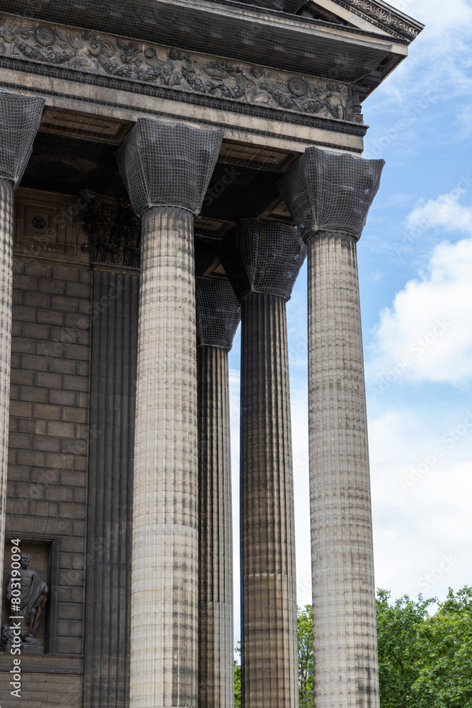 Église de la Madeleine, church located on the Place de la Madeleine in the 8th arrondissement of Paris, France, which is a perfect example of the neoclassical style with its octostyle portico. Église de la Madeleine, church located on the Place de la Madeleine in the 8th arrondissement of Paris, France, which is a perfect example of the neoclassical style with its octostyle portico.