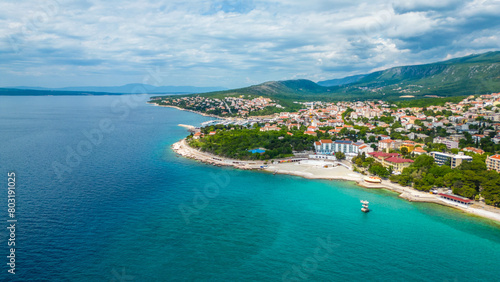 Novi Vinodolski, nestled along the stunning Adriatic coast of Croatia, is a hidden gem known for its captivating blend of history, natural beauty, and seaside charm captured by drone photo