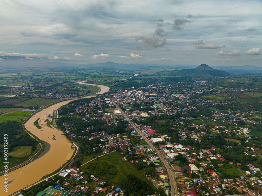 Drone view of Valencia City with river in mountain province. Mindanao, Philippines.
