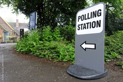 UK polling station direction sign outside a village hall photo