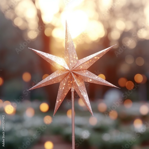 Star-shaped Christmas ornament with warm lights in the background
