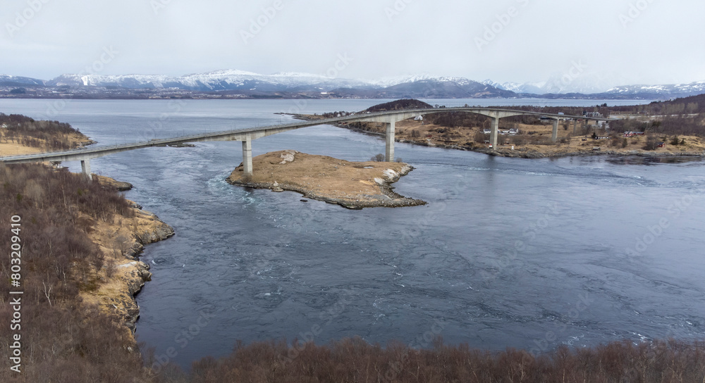 Aerial drone view of world's strongest tidal whirlpools - maelstroms - between Saltfjorden and Skjerstad Fjord t in Saltstraumen, Norway