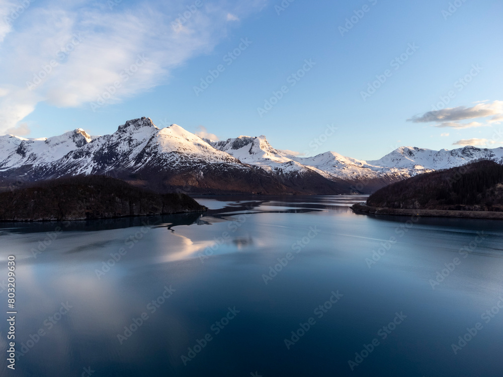 Panoramic drone view of Holandsfjord and Nordfjord in Nordland county. In the background is the Svartisen glacier, Norway's second largest glacier