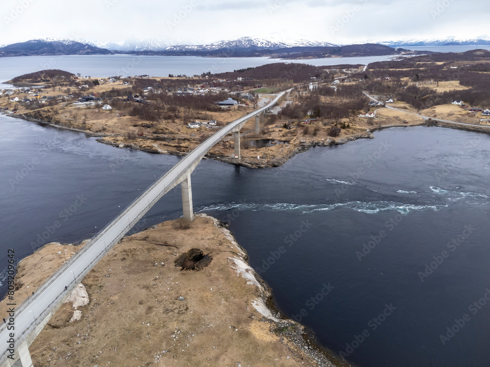Aerial drone view of world's strongest tidal whirlpools - maelstroms - between Saltfjorden and Skjerstad Fjord t in Saltstraumen, Norway