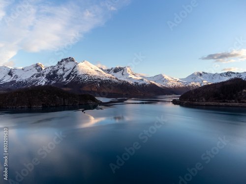 Obraz na płótnie Panoramic drone view of Holandsfjord and Nordfjord in Nordland county. In the background is the Svartisen glacier, Norway's second largest glacier w salonie