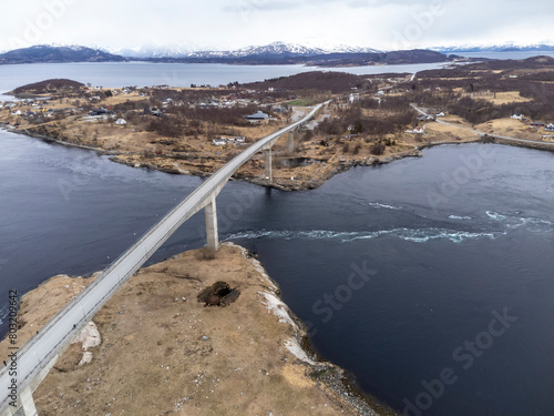 Obraz na płótnie Aerial drone view of world's strongest tidal whirlpools - maelstroms - between Saltfjorden and Skjerstad Fjord t in Saltstraumen, Norway w salonie