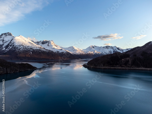 Obraz na płótnie Panoramic drone view of Holandsfjord and Nordfjord in Nordland county. In the background is the Svartisen glacier, Norway's second largest glacier w salonie