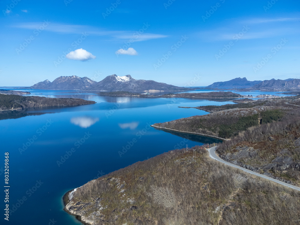 Panoramic drone view of Holandsfjord and Nordfjord in Nordland county. In the background is the Svartisen glacier, Norway's second largest glacier