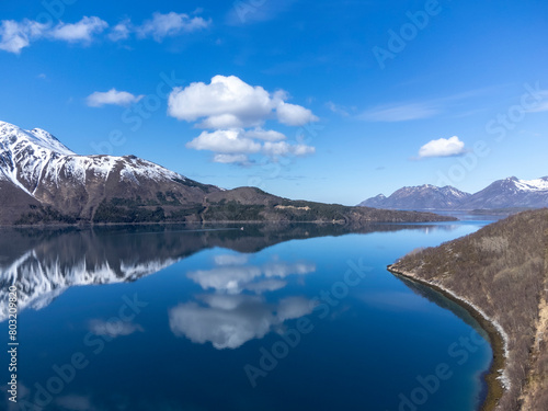 Obraz na płótnie Panoramic drone view of Holandsfjord and Nordfjord in Nordland county. In the background is the Svartisen glacier, Norway's second largest glacier w salonie