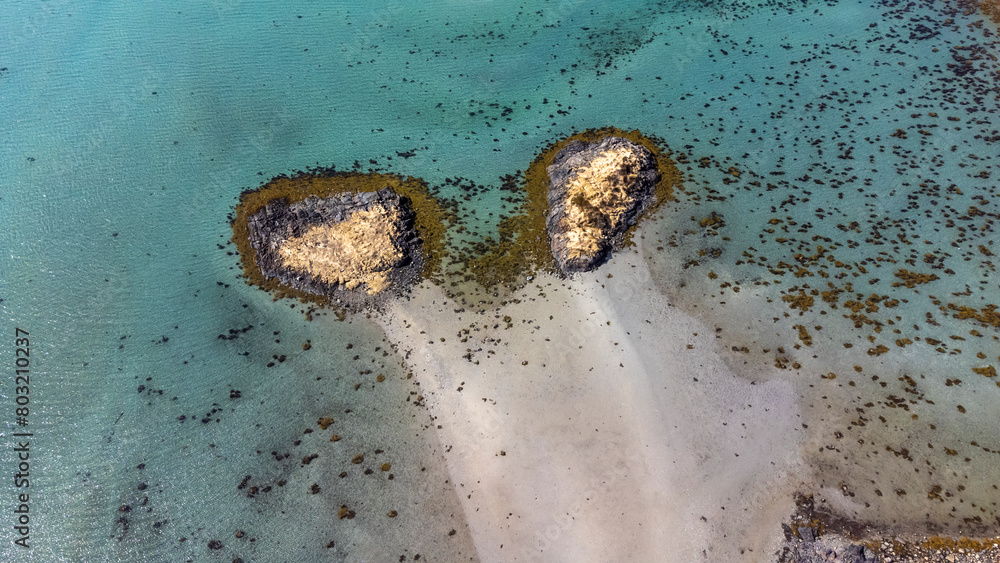 Drone shot over the islands of Storoya, Hestoya, Amnoya and Gronnoya in Nordland county, Norwa