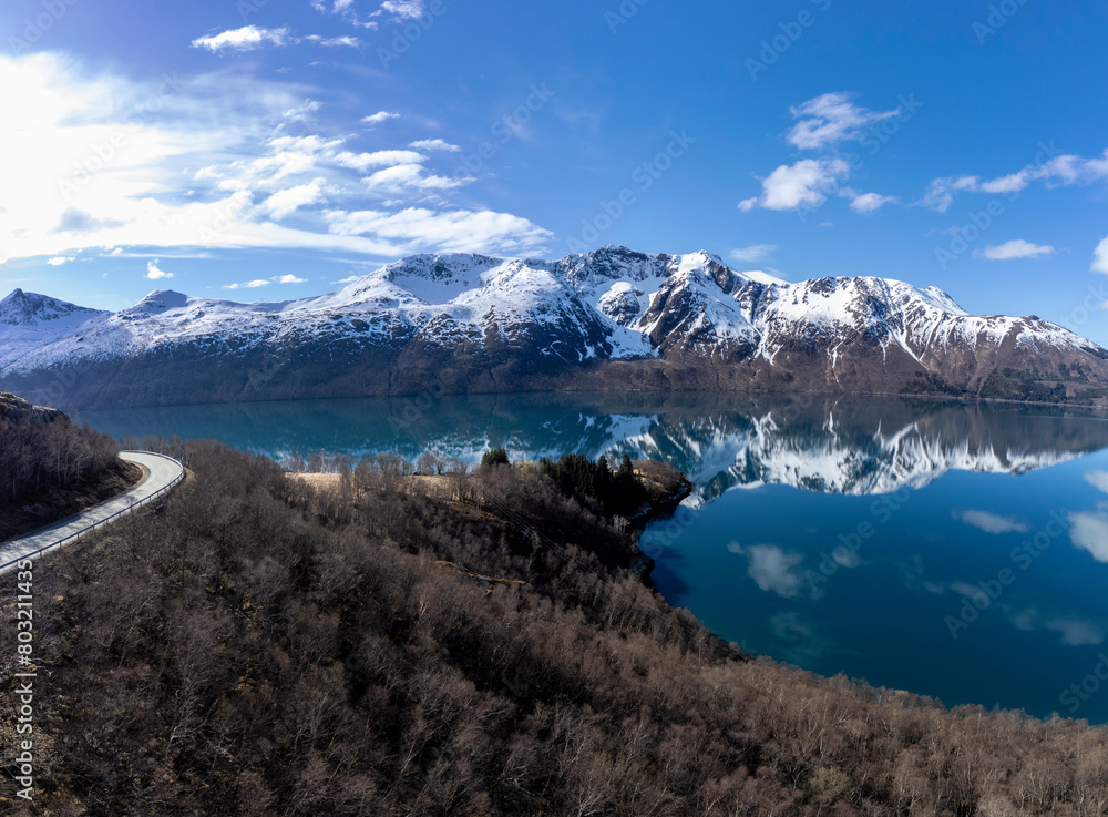 Panoramic drone view of Holandsfjord and Nordfjord in Nordland county. In the background is the Svartisen glacier, Norway's second largest glacier
