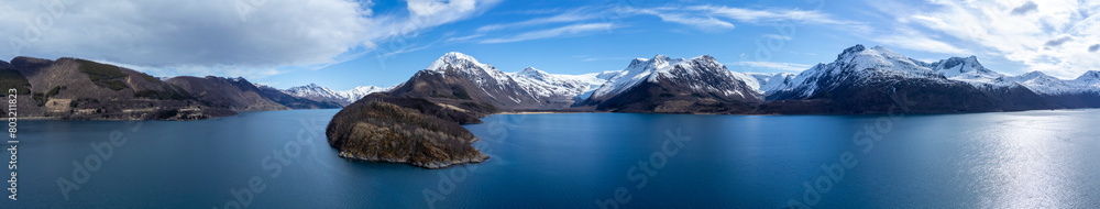 Panoramic drone view of Holandsfjord and Nordfjord in Nordland county. In the background is the Svartisen glacier, Norway's second largest glacier Panoramic drone view of Holandsfjord and Nordfjord in Nordland county. In the background is the Svartisen glacier, Norway's second largest glacier