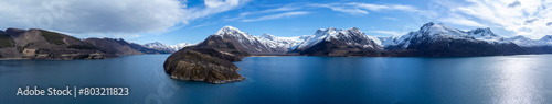 Obraz na płótnie Panoramic drone view of Holandsfjord and Nordfjord in Nordland county. In the background is the Svartisen glacier, Norway's second largest glacier w salonie