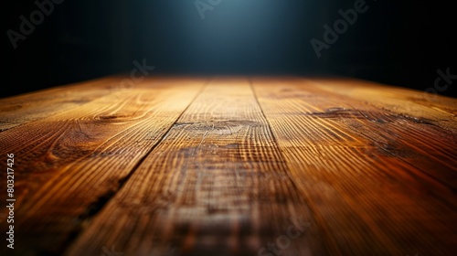 Rustic wooden table background with spotlight photo
