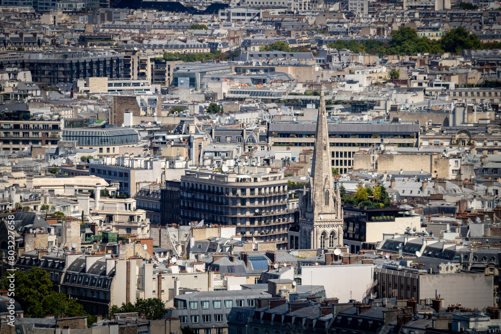 Panoramic view of the roofs of the buildings around the Tour Eiffel and Seine river, Paris, France.