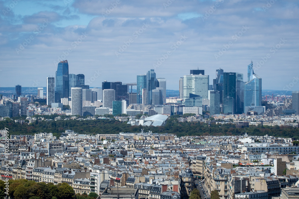 Panoramic view of La Défense is the main business district of Paris, its metropolitan area and the Ile de France region. Bois de Boulogne. Tour Eiffel, Paris, France Panoramic view of La Défense is the main business district of Paris, its metropolitan area and the Ile de France region. Bois de Boulogne. Tour Eiffel, Paris, France