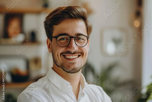 portrait of smiling businessman in glasses indoors professional success concept