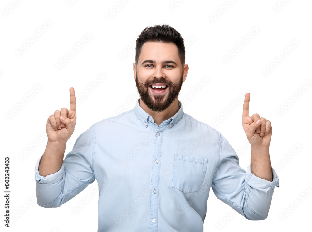 Happy young man with mustache pointing at something on white background Happy young man with mustache pointing at something on white background