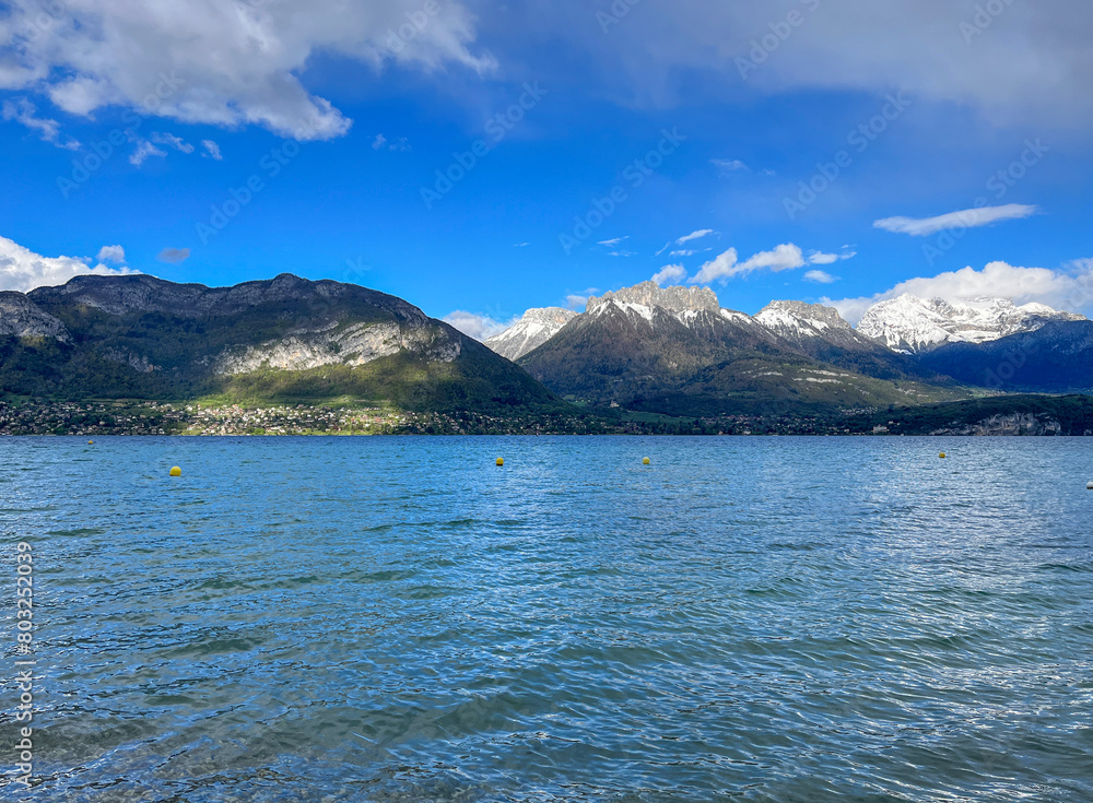 Haute-Savoie, France, 04-25-2024: panoramic view of Annecy lake, the second largest in France, known for being the cleanest in Europe due to strict environmental regulations in place since the 1960s