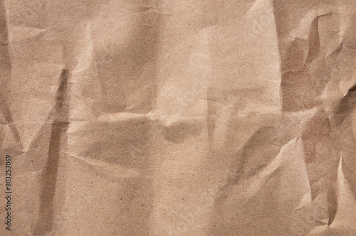 Beige paper texture. Crumpled paper background.